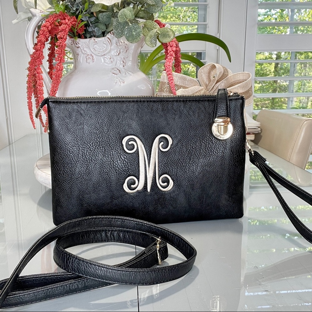 M Monogramed crossbody bag wristlet